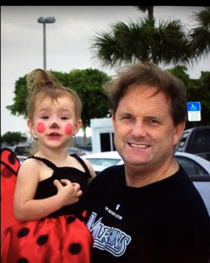 Peter Walsh in Miami Shores with a young neighbor in costume
